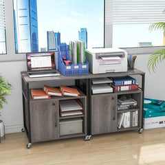 Two file cabinets placed side by side to create a larger storage unit under a window