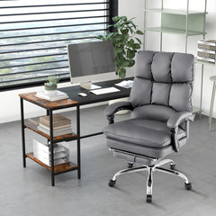 The office chair placed in a modern home study next to a wooden desk with a computer monitor