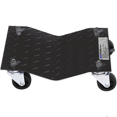 The steel tire skates with four black swivel casters and a textured metal surface