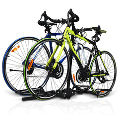 The garage rack holding two road bikes with black and yellow frames