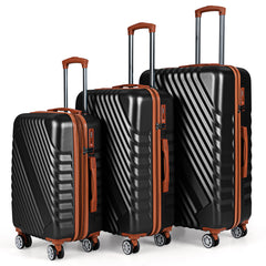 Three black suitcases of varying heights with extended handles in a row