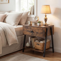 Rustic brown industrial nightstand beside a bed with books and a lamp