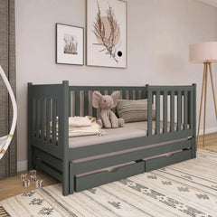 The dark grey kids single bed with two storage drawers in a bedroom setting