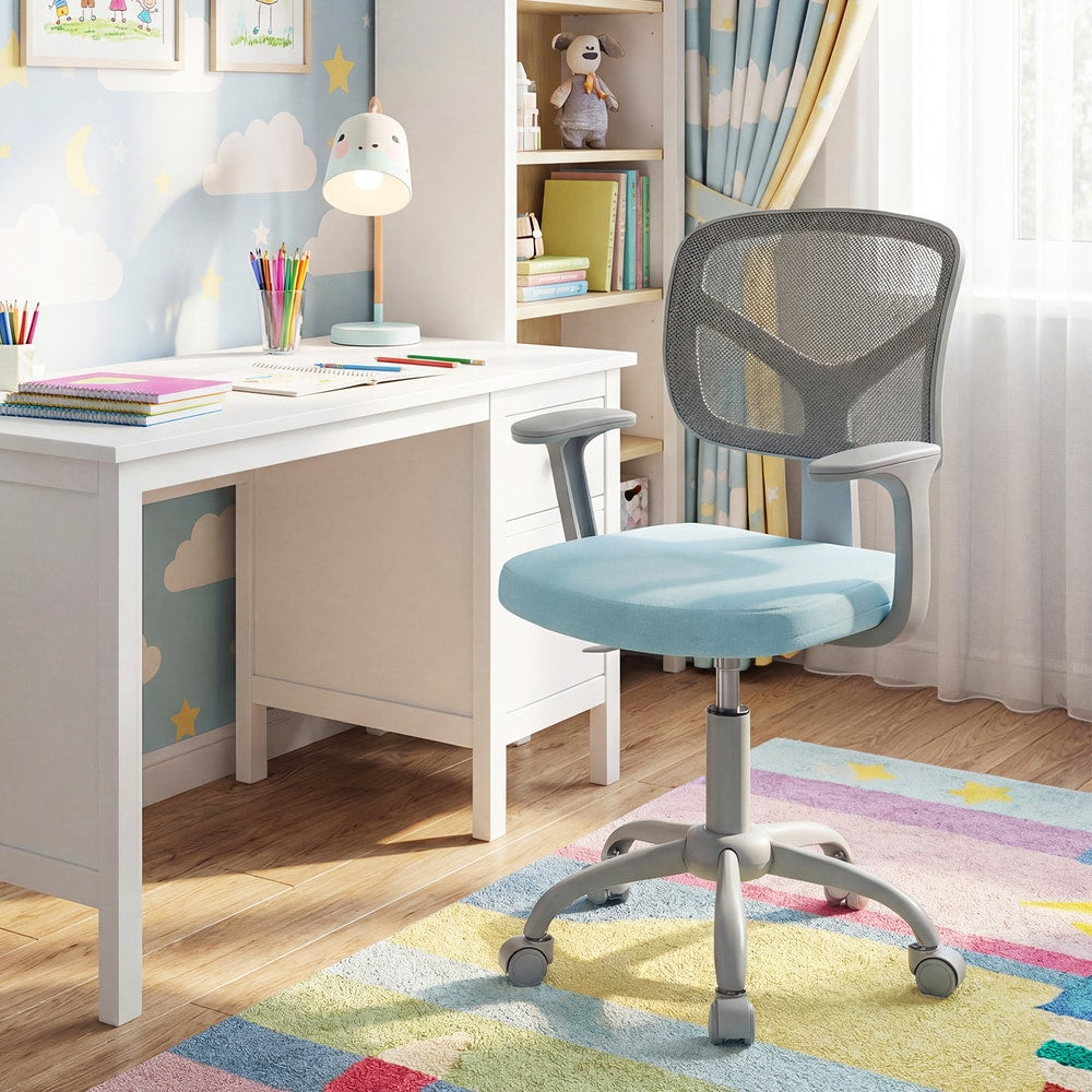 The blue kids desk chair is placed in a child's bedroom setting