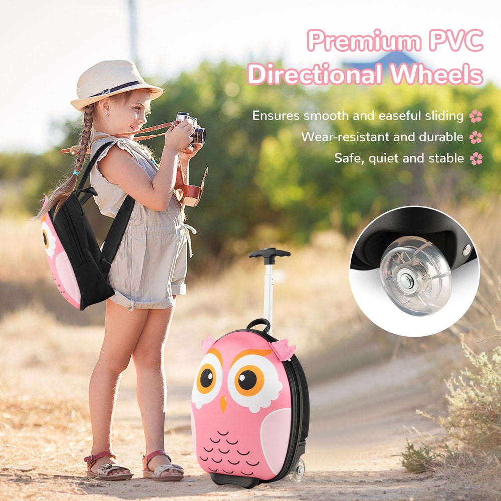 A girl with a pink owl suitcase and backpack on a path
