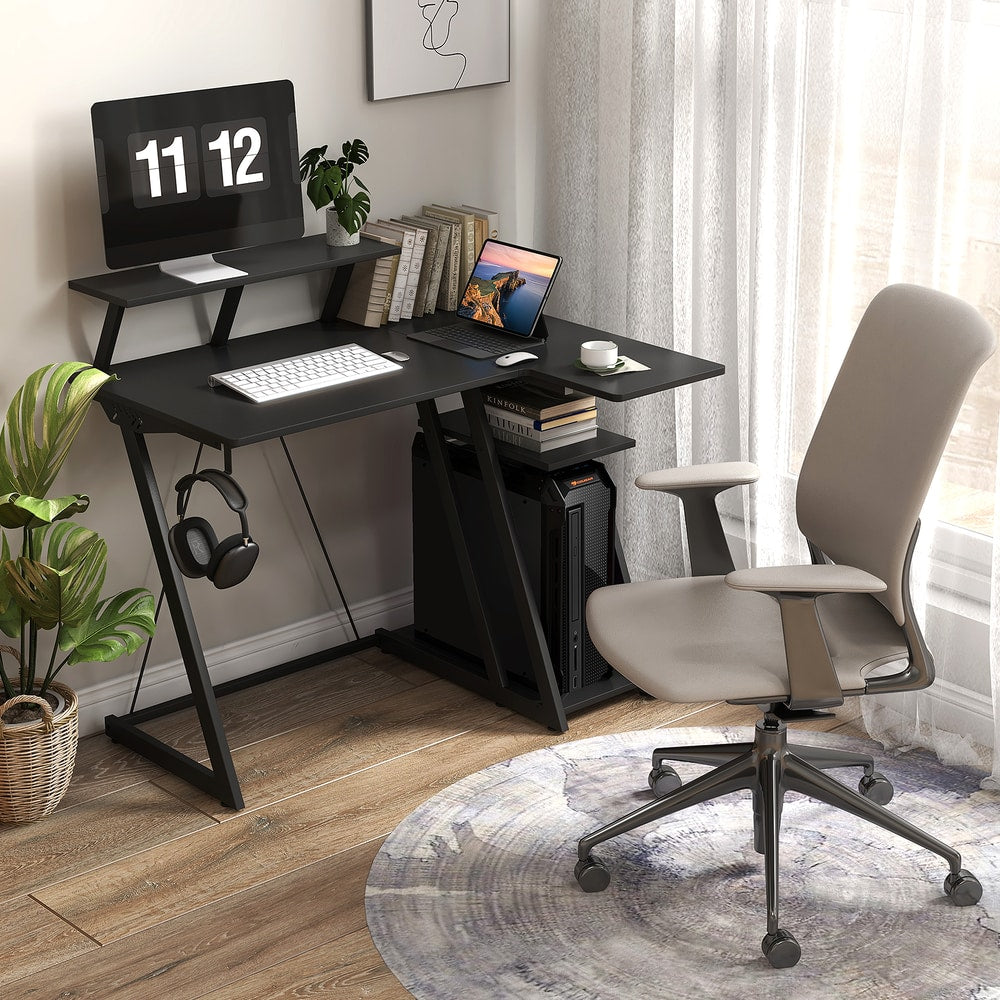 The office desk set up in a bright home office corner with a chair and house plant