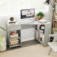 the grey corner desk featuring a computer monitor and open storage shelves in a bright room