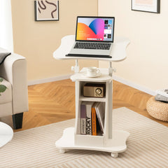 The white laptop table with wheels is shown in a bright room with a sofa and a rug