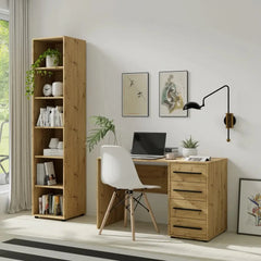 The light wood effect bookcase next to a desk with a laptop and office supplies