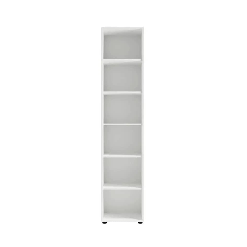 A tall narrow white bookcase with six shelves, shown from the front
