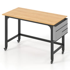 The computer desk with a grey storage drawer unit on the right side