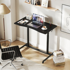 The office desk set up as a workspace with a chair and laptop in a bright home office