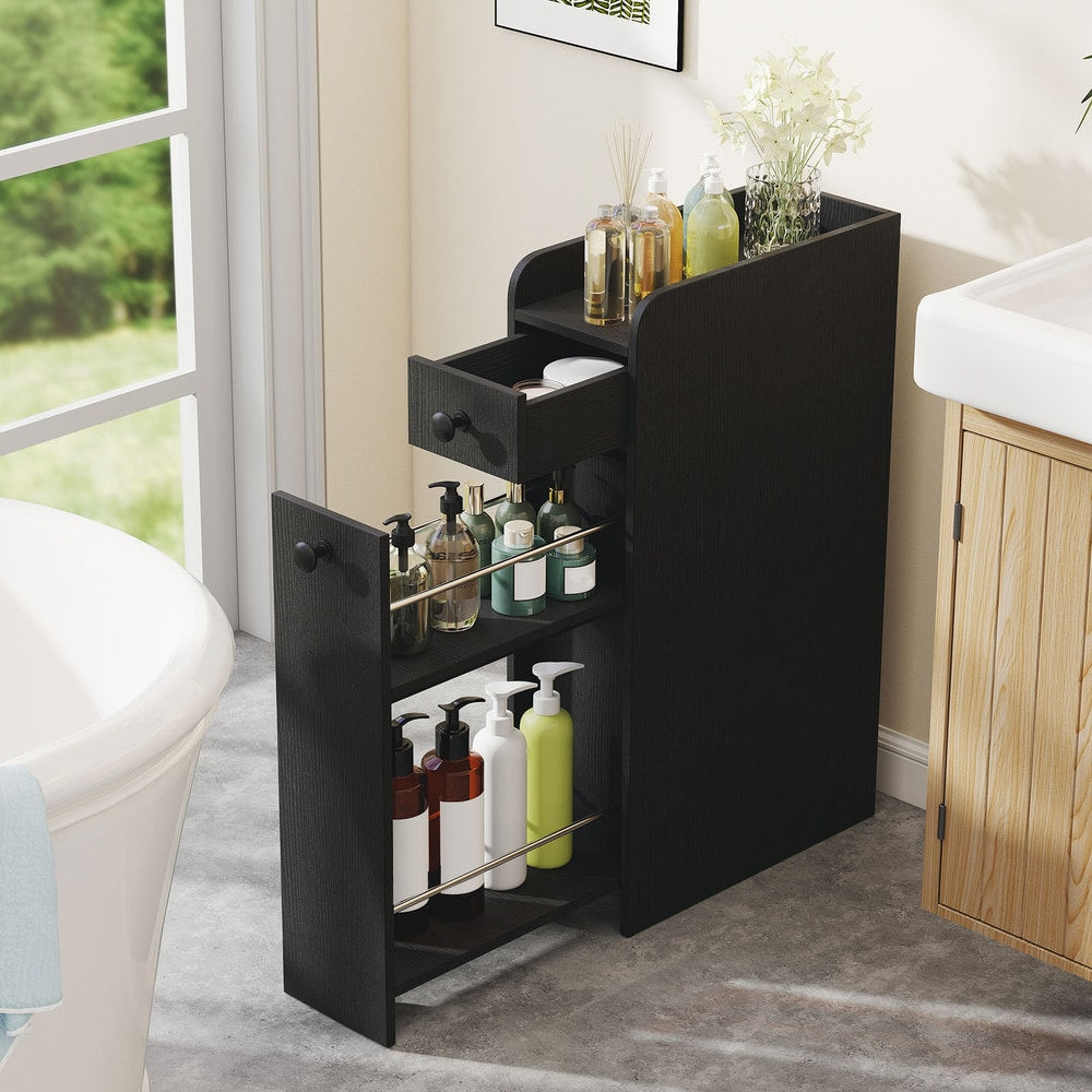 The floor cabinet with the drawer and lower shelf pulled out in a bathroom