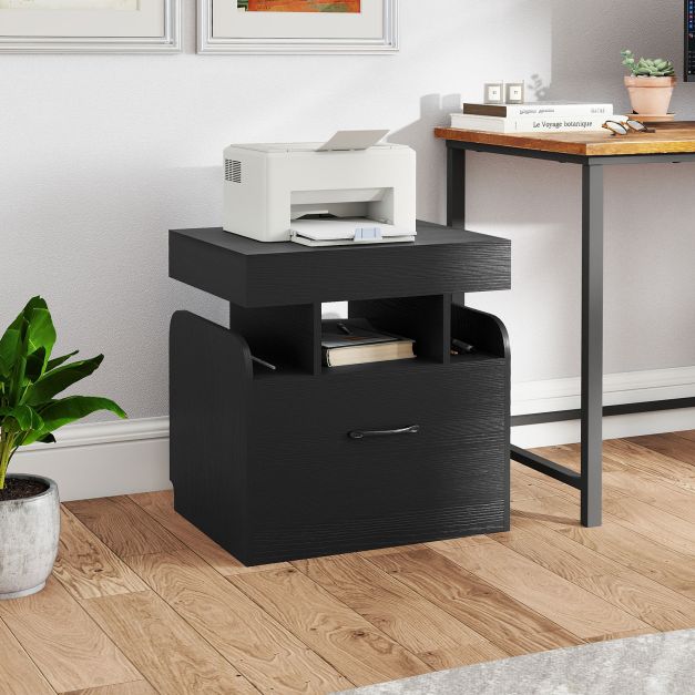 Black bedside table with drawer and shelf used as an office side table with a printer