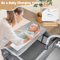 Woman changing a baby on the grey nursery center changing table