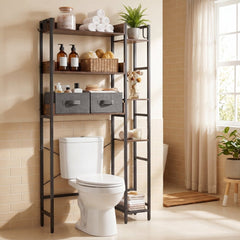 The over toilet storage unit with fabric drawers and hooks in a tiled bathroom