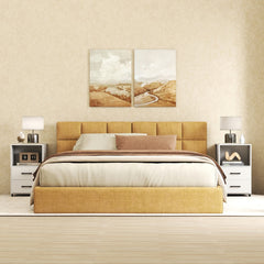 Two white nightstands flanking a bed in a bedroom setting