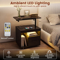 Black bedside table with ambient LED lighting and remote control, showing charging station