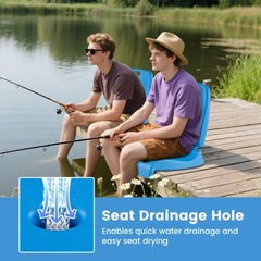 Two men fishing on a wooden dock with the blue chairs