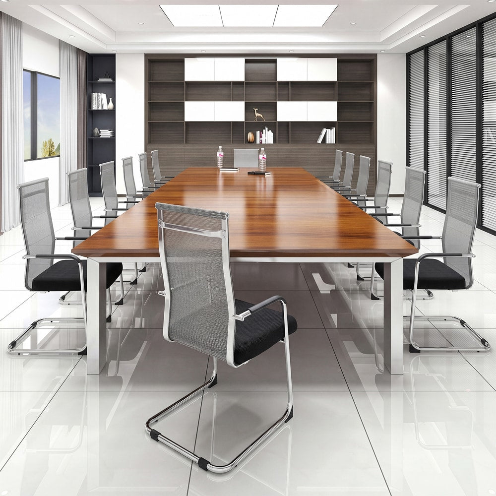 Office guest chairs arranged around a large boardroom table