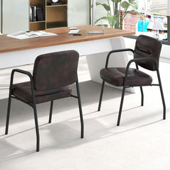 Two rustic brown waiting room chairs shown from the back in an office setting
