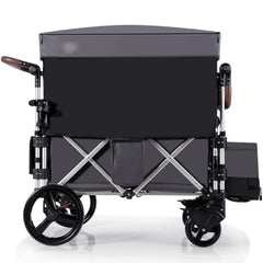 Side view of the grey double stroller wagon with canopy down and storage compartments