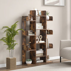 Rustic brown tree bookshelf in a living room next to a sofa and plant