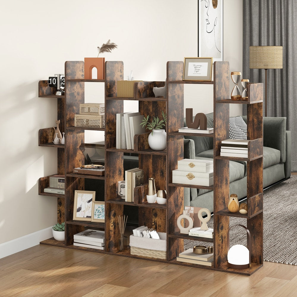 Rustic brown tree bookcase with books and decorative items in a lounge