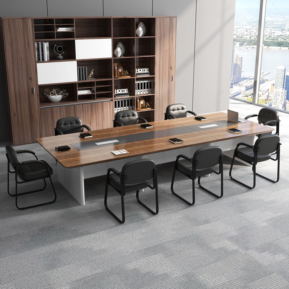 Black waiting room chairs in a large corporate office boardroom