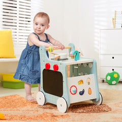 Baby girl playing with the blue wooden baby stroller push and pull learning activity center