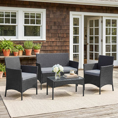 Outsunny 4 Piece Rattan Garden Furniture Sofa Set with Loveseat, Armchairs, Glass-Top Coffee Table and Cushions, Black