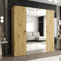 The oak effect hinged wardrobe with central mirrors placed in a contemporary room
