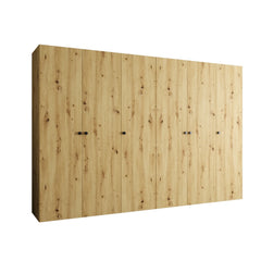 The hinged wardrobe with a wood effect finish shown freestanding