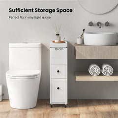 White slim floor cabinet with two drawers and baskets in a bathroom