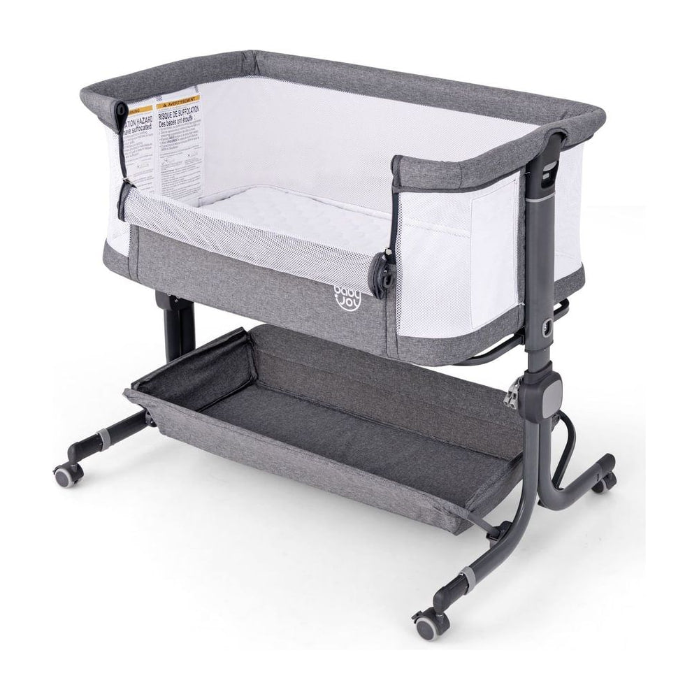 Baby Bassinet Bedside Sleeper with storage shelf and wheels in dark grey