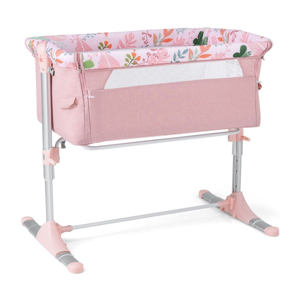 Baby Bassinet Crib Bedside Sleeper with Adjustable Height in pink with floral pattern, front view