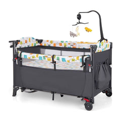 5-in-1 Baby Bassinet Bedside Sleeper in grey with hanging toys and a patterned liner