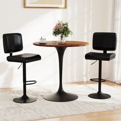 The adjustable chairs placed on either side of a small round wooden table