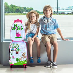 Children sitting with the kids luggage set by a window
