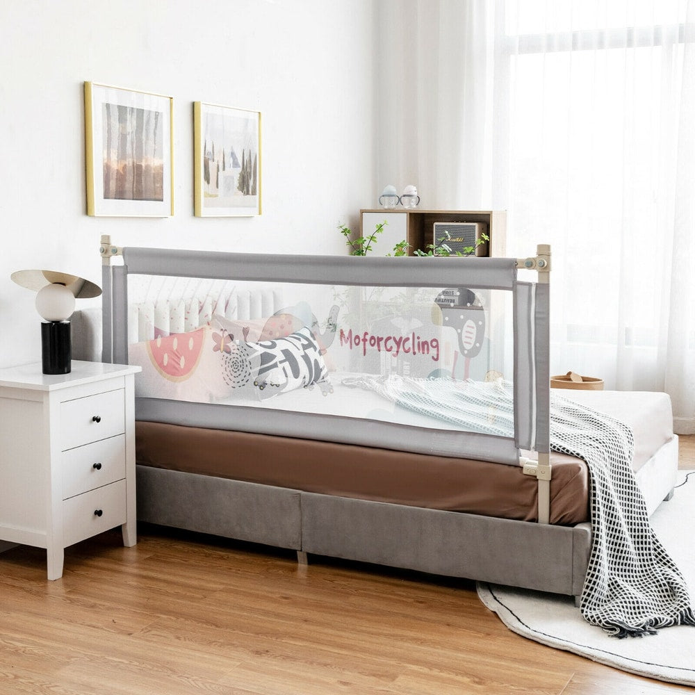 The baby bed rail guard installed on a bed with a child sleeping