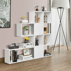 The white display and storage bookshelf shown in a room with decorative items and books