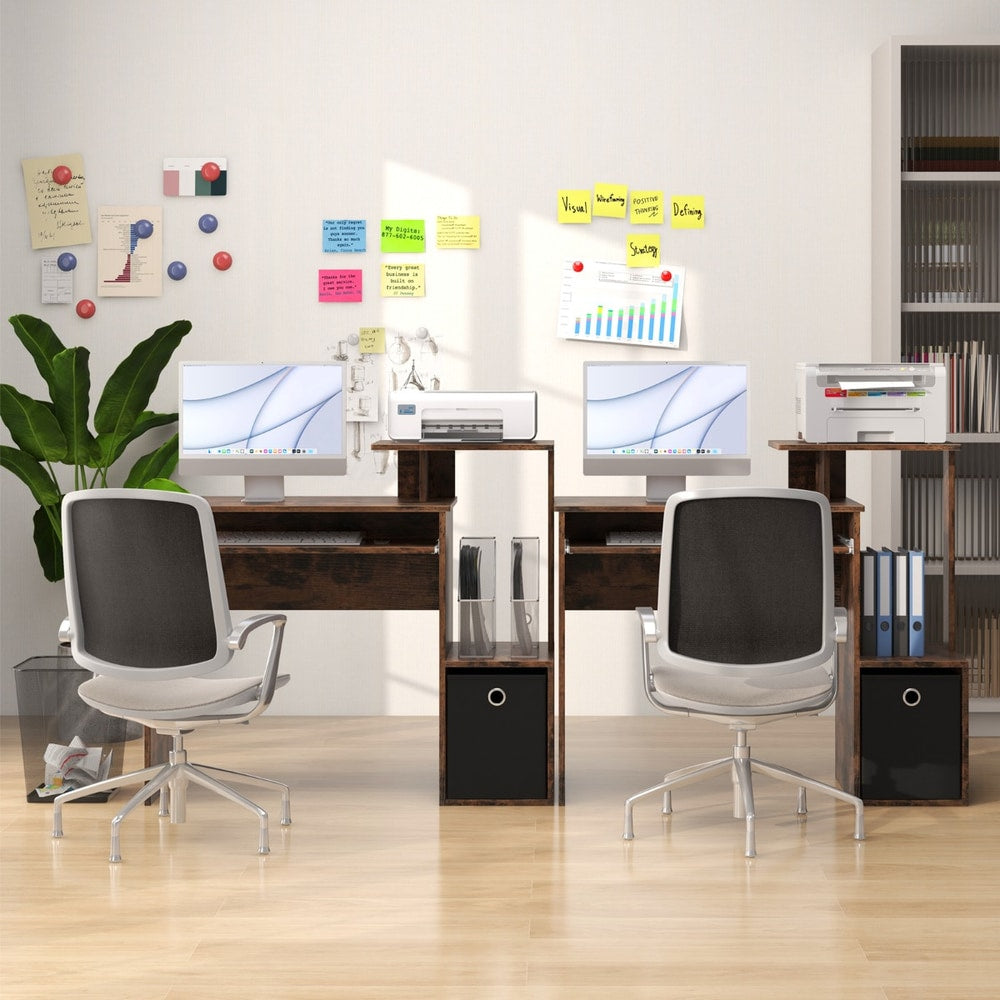 Two office desks placed side by side in a home office with computers and chairs