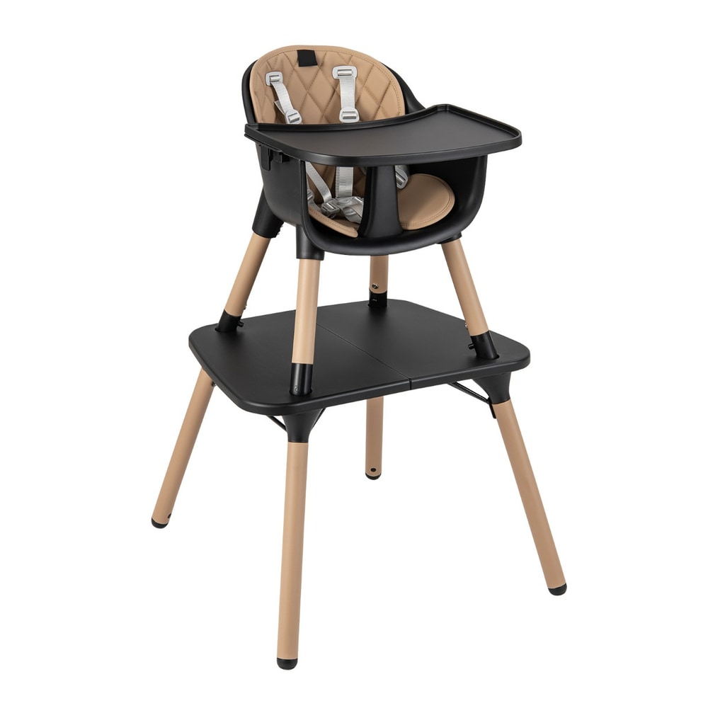 The high chair with a beige padded seat and black tray on a white background