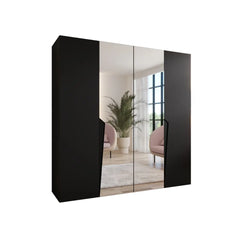 The hinged wardrobe in black with mirrored doors shown from a side angle
