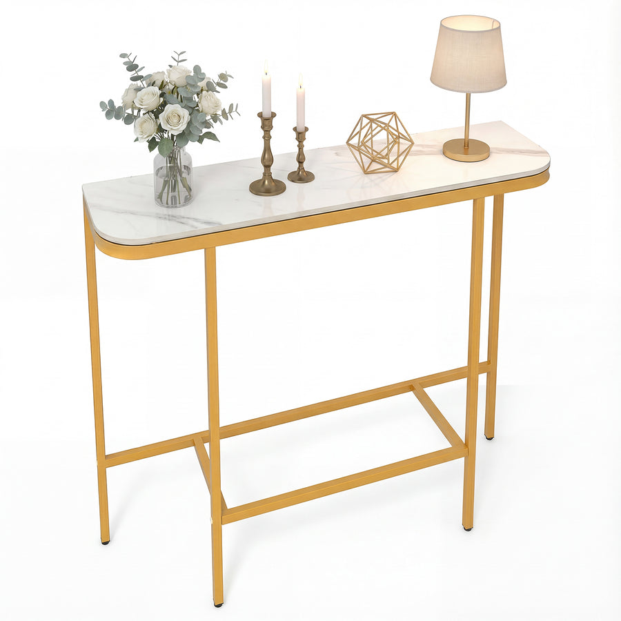 Entryway Table with a white marble effect top and gold metal frame decorated with home accessories