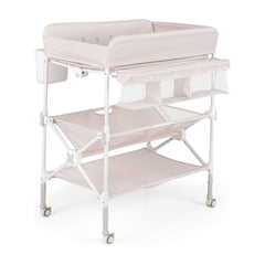 Foldable Baby Changing Table with Wheels and Adjustable Height in light pink, shown with storage shelves and side caddy
