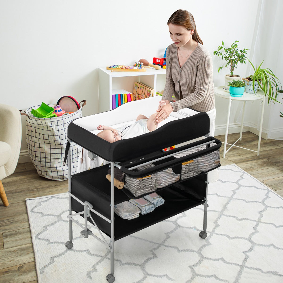 Folding Nursery Changing Table with Lockable Wheels and Storage Basket-Black