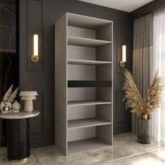 The hinged wardrobe with open doors, showing empty shelves and a hanging rail