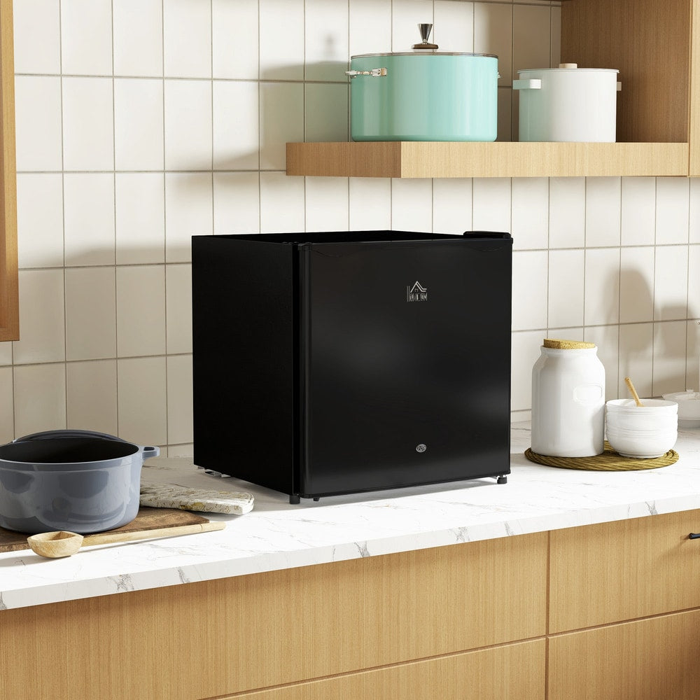 Black countertop fridge in a modern kitchen setting on a marble worktop