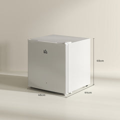 The cream white countertop fridge shown with black lines indicating its external dimensions